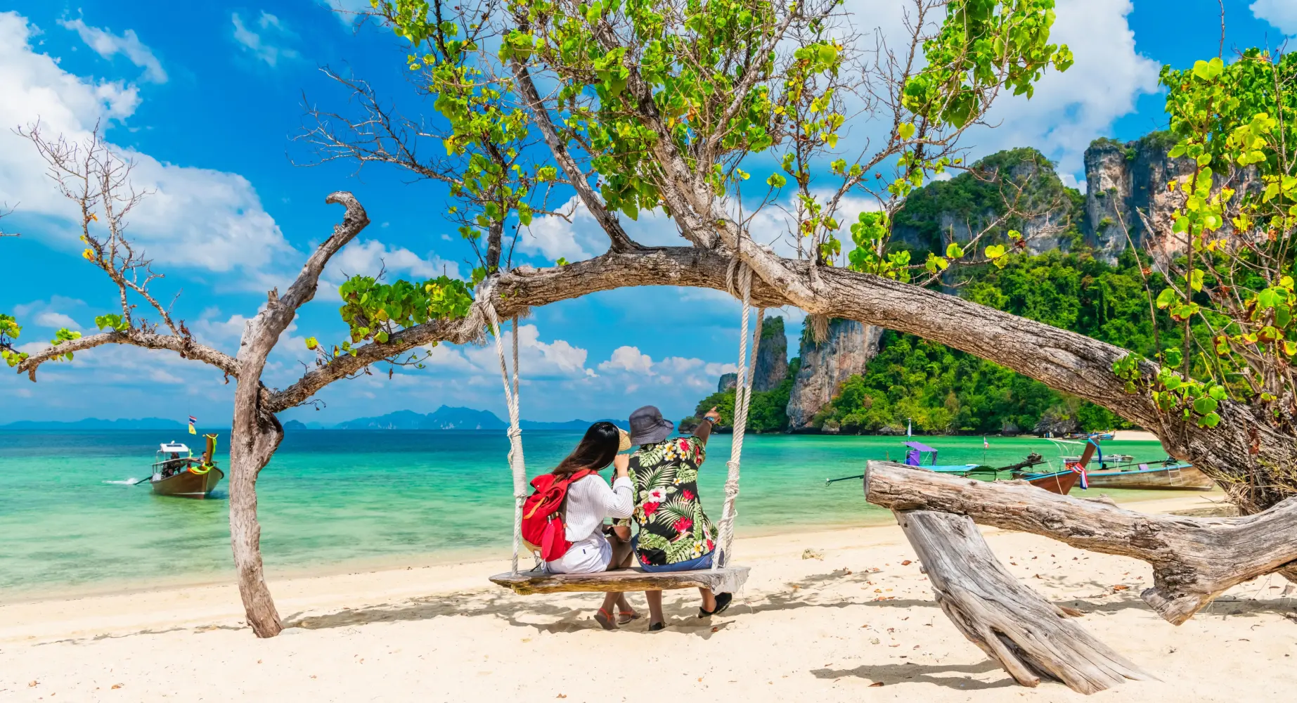 Couple Swinging near a beach